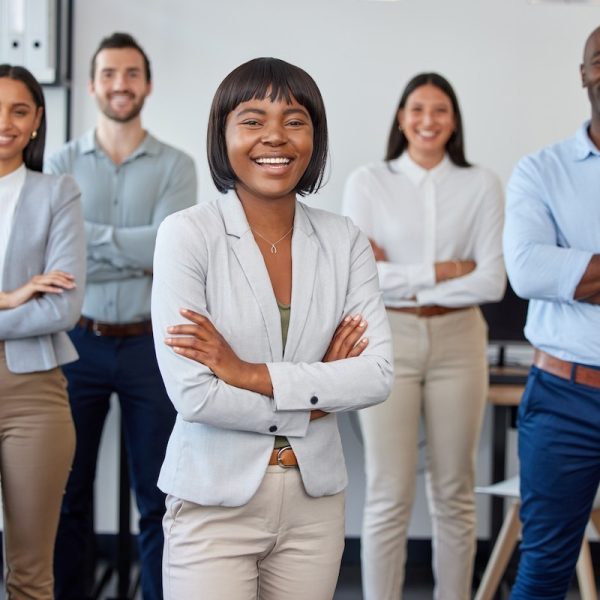 Corporate team smiling together